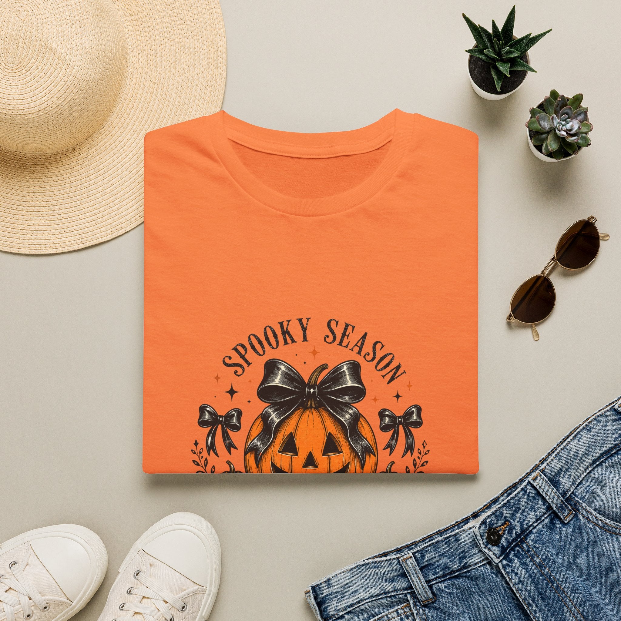 Spooky Season Jack-O'-Lantern Bow T-Shirt — Cute Halloween Gift for Women Graphic Tee